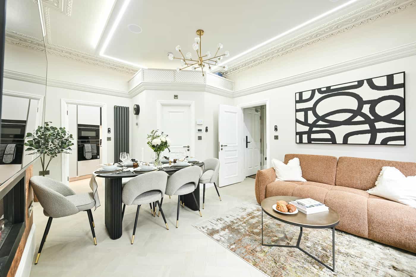 Friendly property manager at desk for JF Property Partners